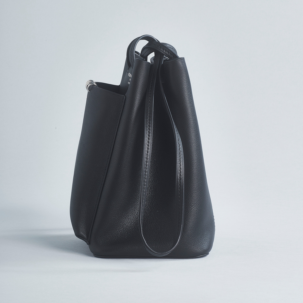 bucket bag soft leather outside pocket shoulder strap black piercing