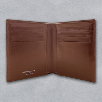 compact billfold in glazed leather with hand embossed brown lizard motif