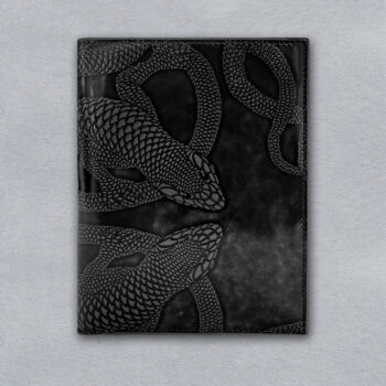 compact ticket holder in glazed leather, hand embossed with black lizard motif