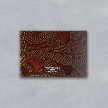 compact cardholder in glazed leather with hand embossed brown lizard motif